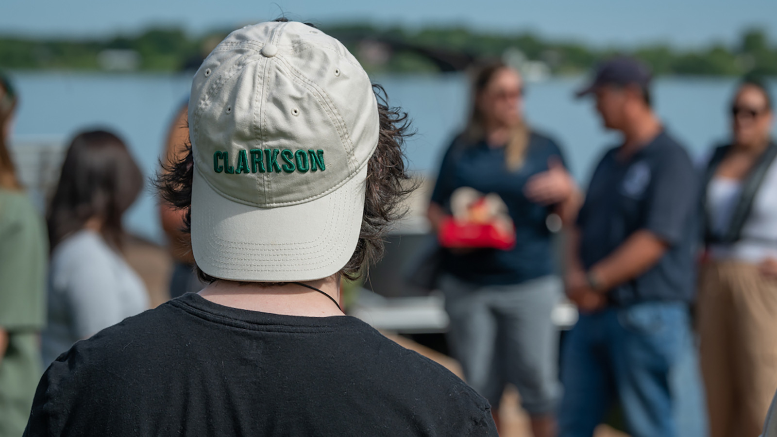 Student wearing a Clarkson hat during ASET Research Experience for Undergrads (REU)